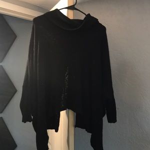 Super cute turtle neck sweater with open back